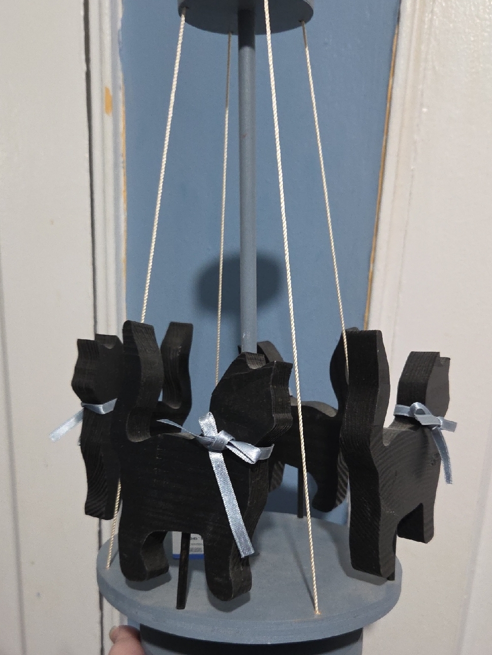 Handcrafted Black Wooden Cat Mobile with Blue Ribbon Accents